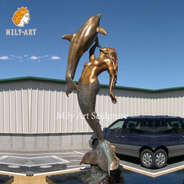 Bronze mermaid sculpture with dolphin for outdoor decor