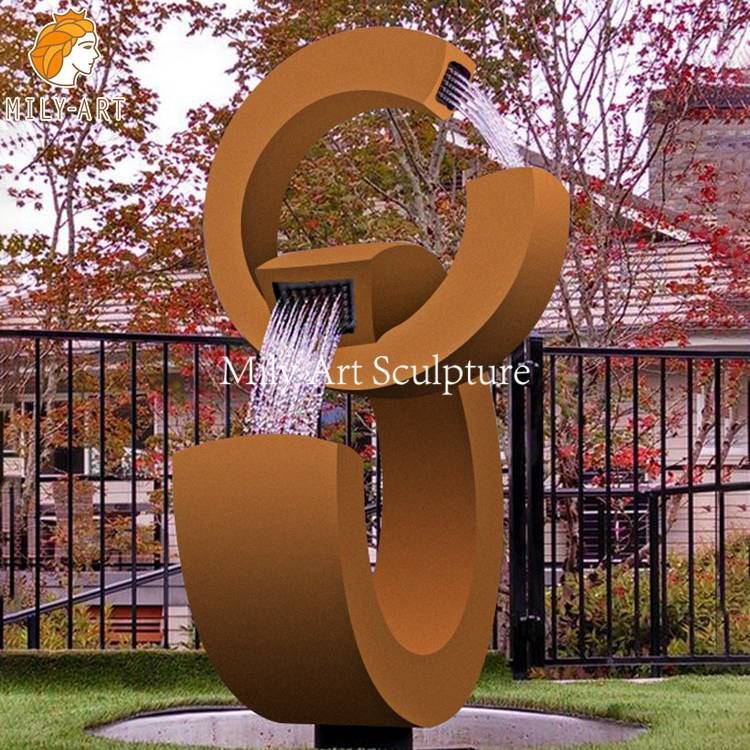 1. corten steel water fountain mily sculpture