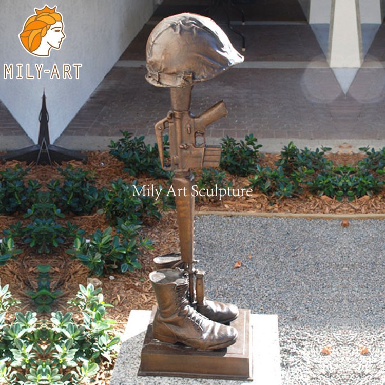 soldier kneeling at cross statue