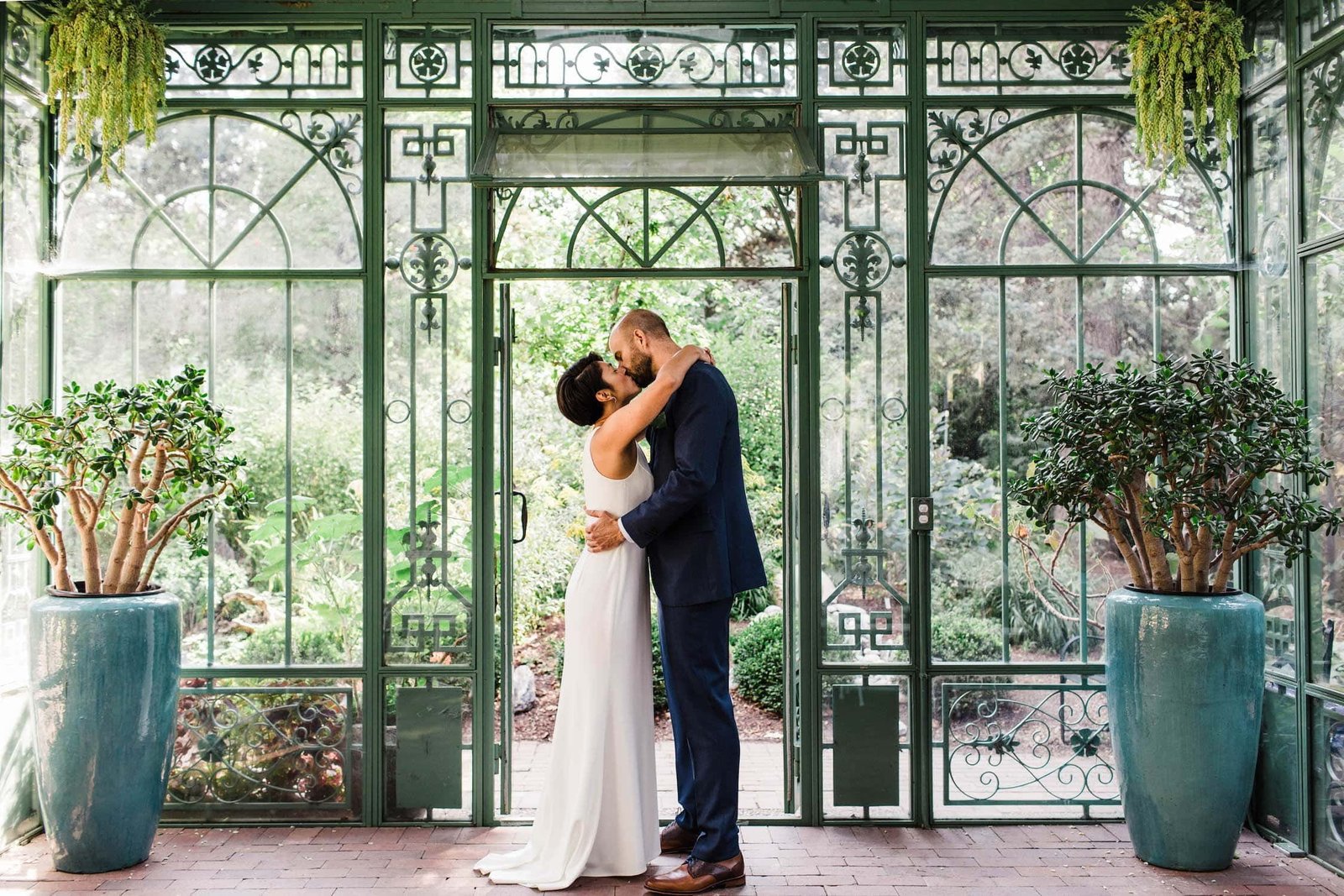 Large decorative iron gazebo and greenhouse for a wedding setting
