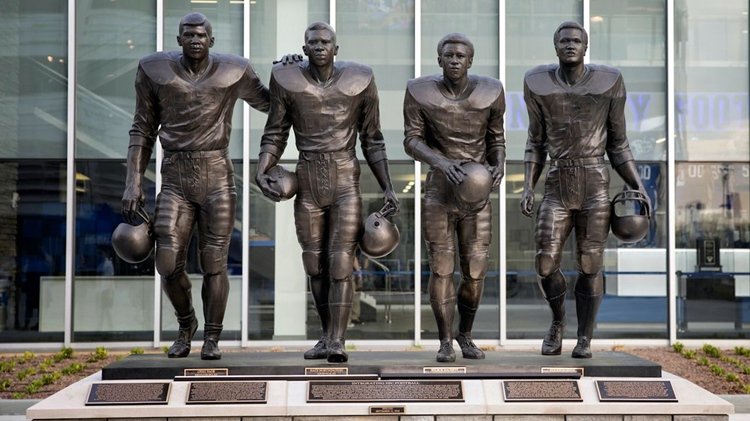 3.1. football player sculptures mily statue