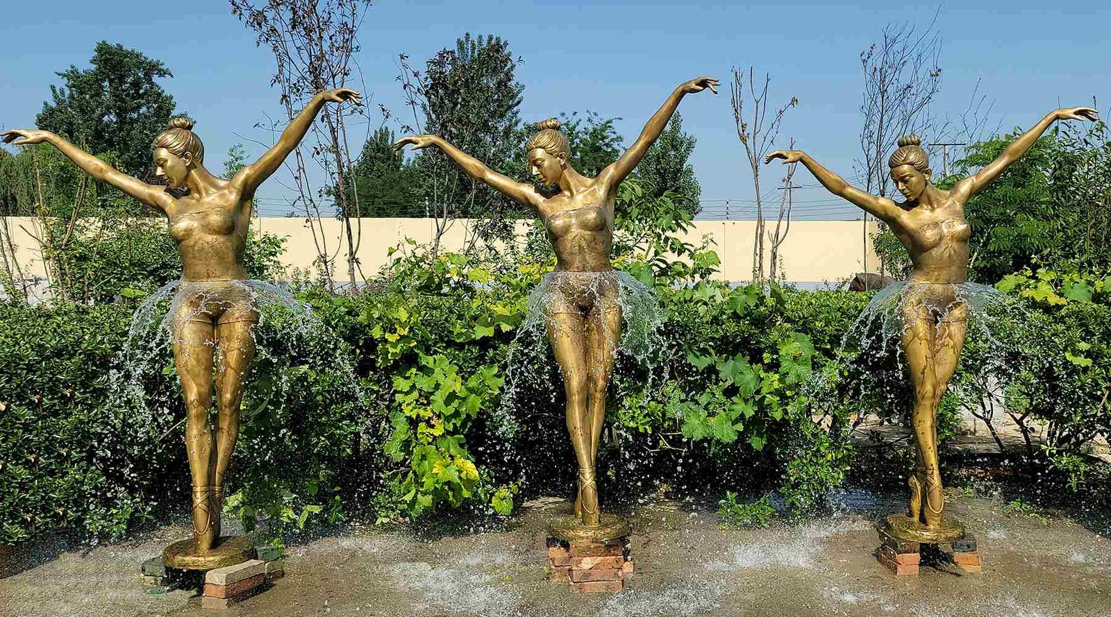 Custom bronze dancing figure fountain made by Mily