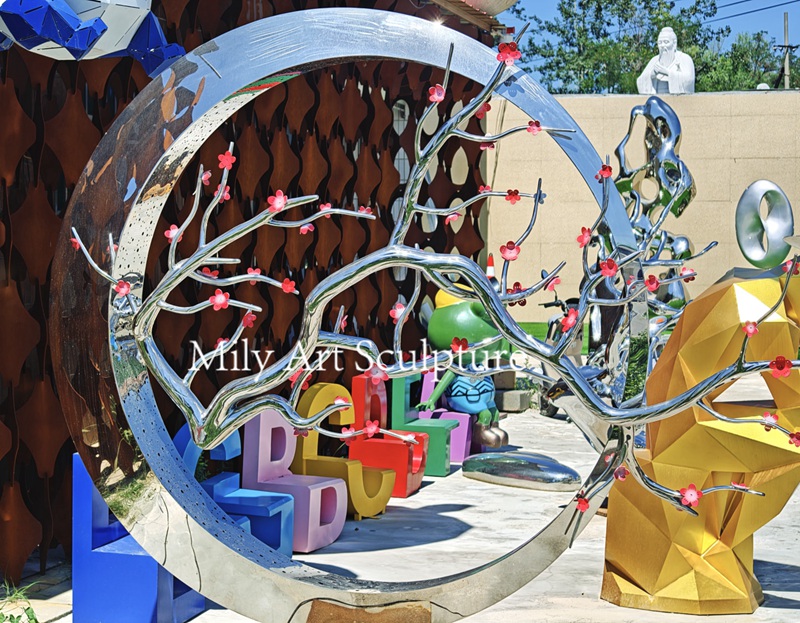 Modern Circular Stainless Steel Water Feature with Flowers