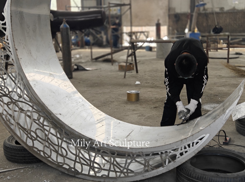 Golden Modern Metal Moon Sculpture Polishing