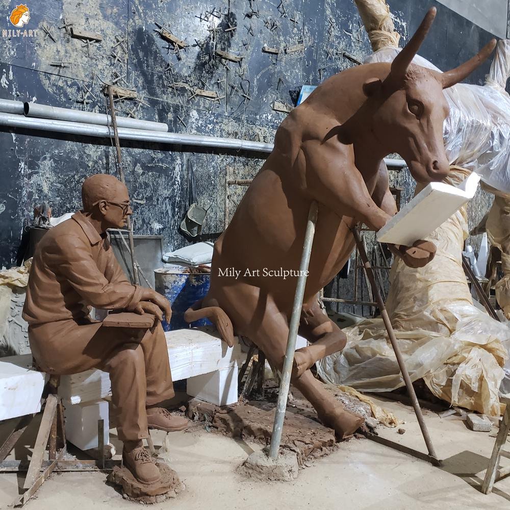 Bronze Man And Bull Reading Books Statue Clay Model