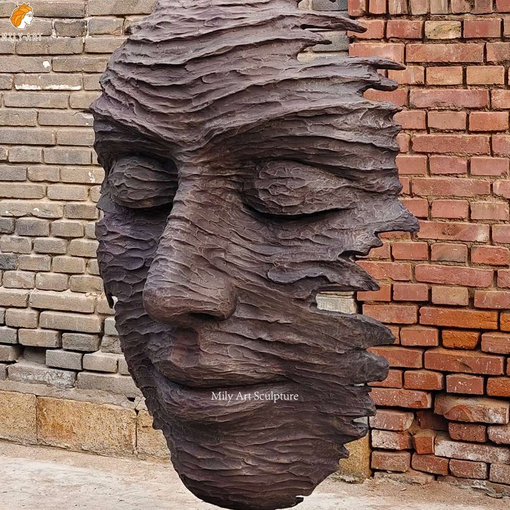 Cast Modern Bronze Face Hanging Sculpture