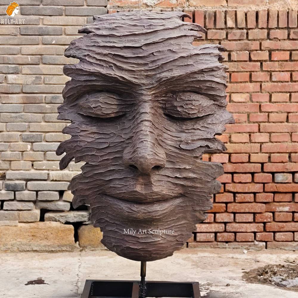 Modern Bronze Face Hanging Sculpture
