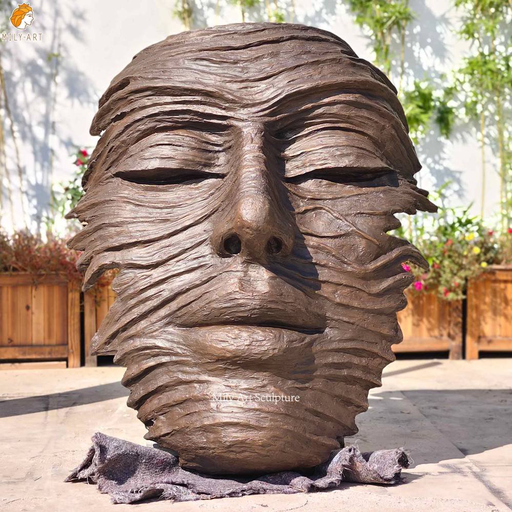 Modern Brown Bronze Face Hanging Sculpture