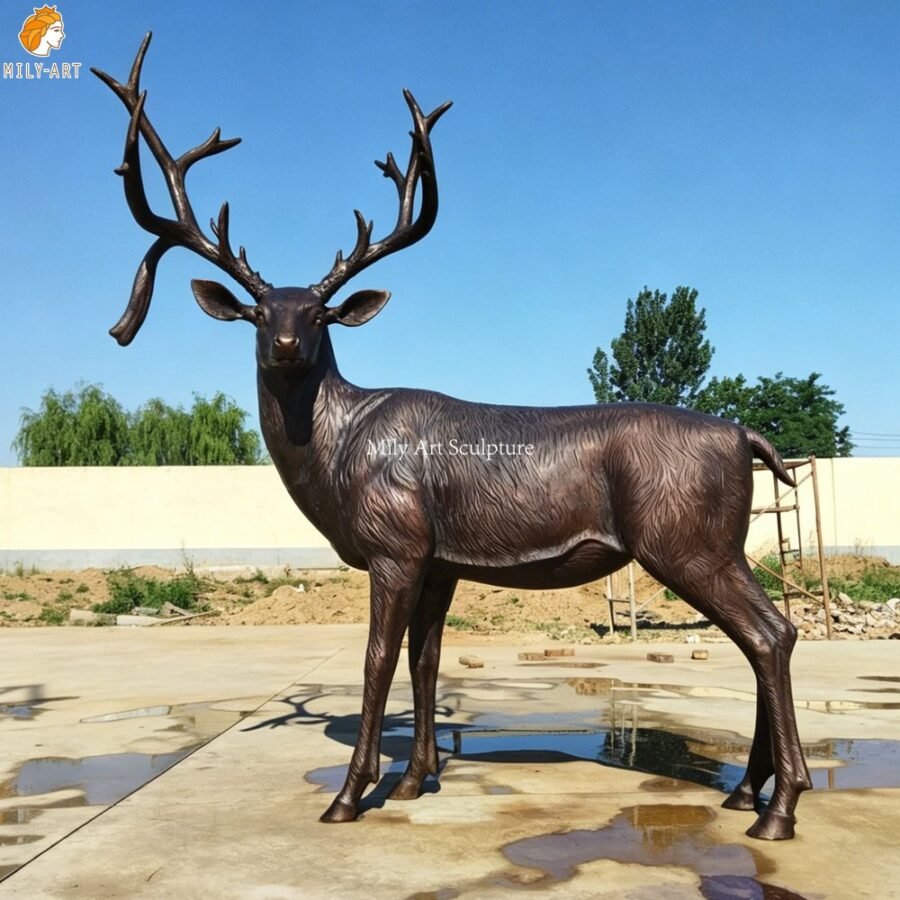 Monumental bronze whitetail deer statue for a garden