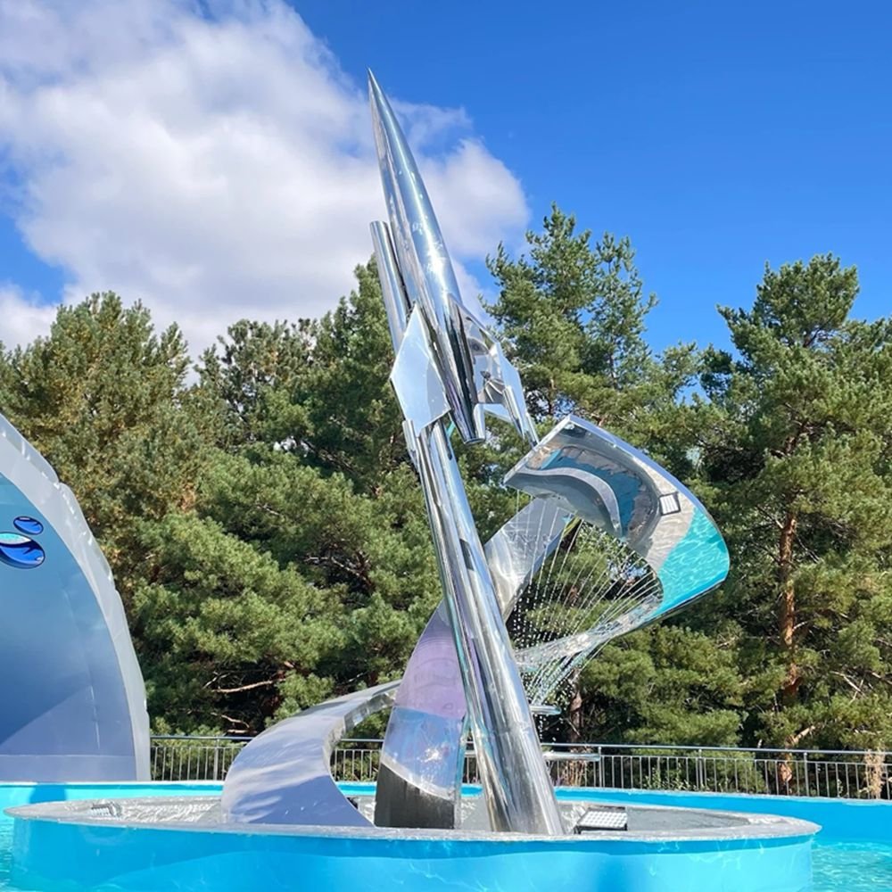 Large-Scale Mirror-Polished Outdoor Metal Art with a Rocket Fountain