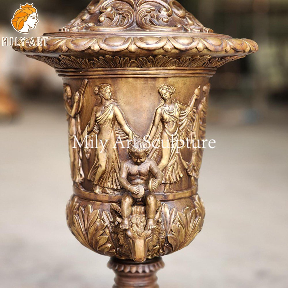 Large bronze Urn with a Classical Cherub Design for Garden Decor MLBS-378 Large bronze Urn with a Classical Cherub
