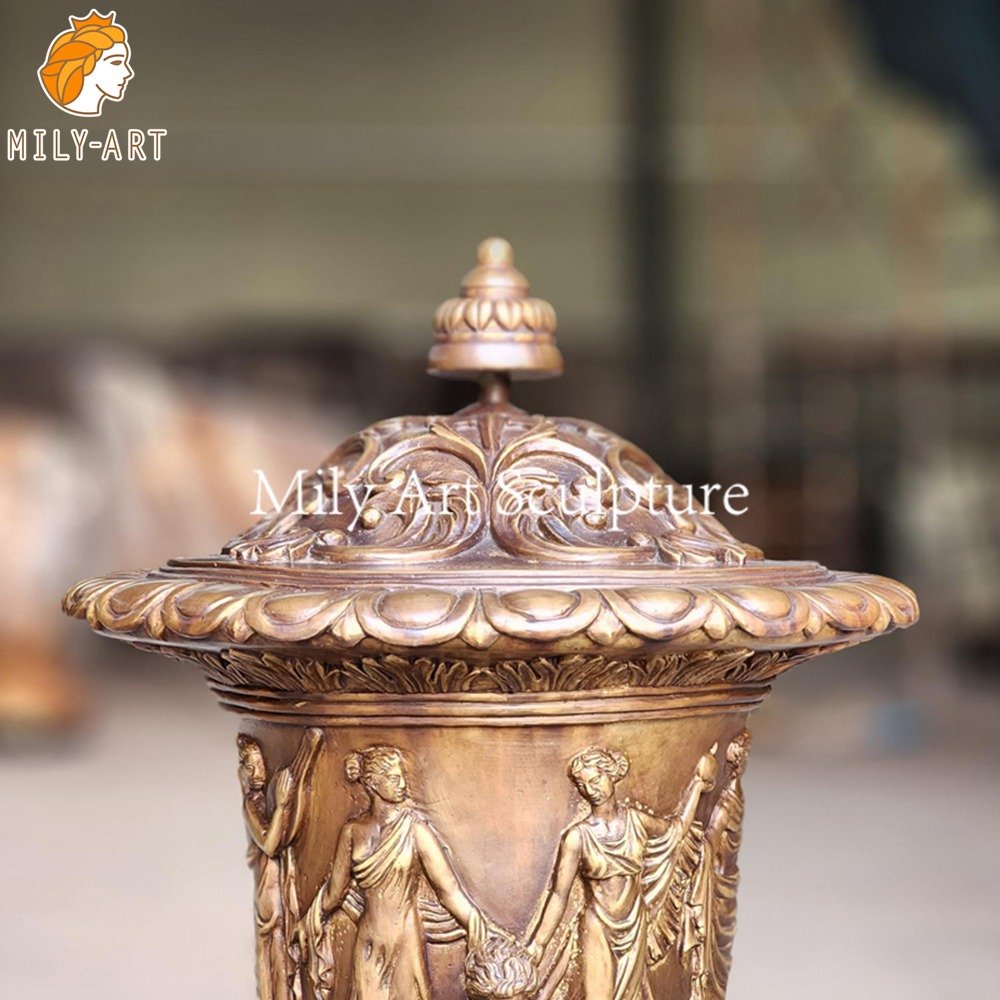 Large bronze Urn with a Classical Cherub Design for Garden Decor MLBS-378 Large bronze Urn with a Classical Cherub