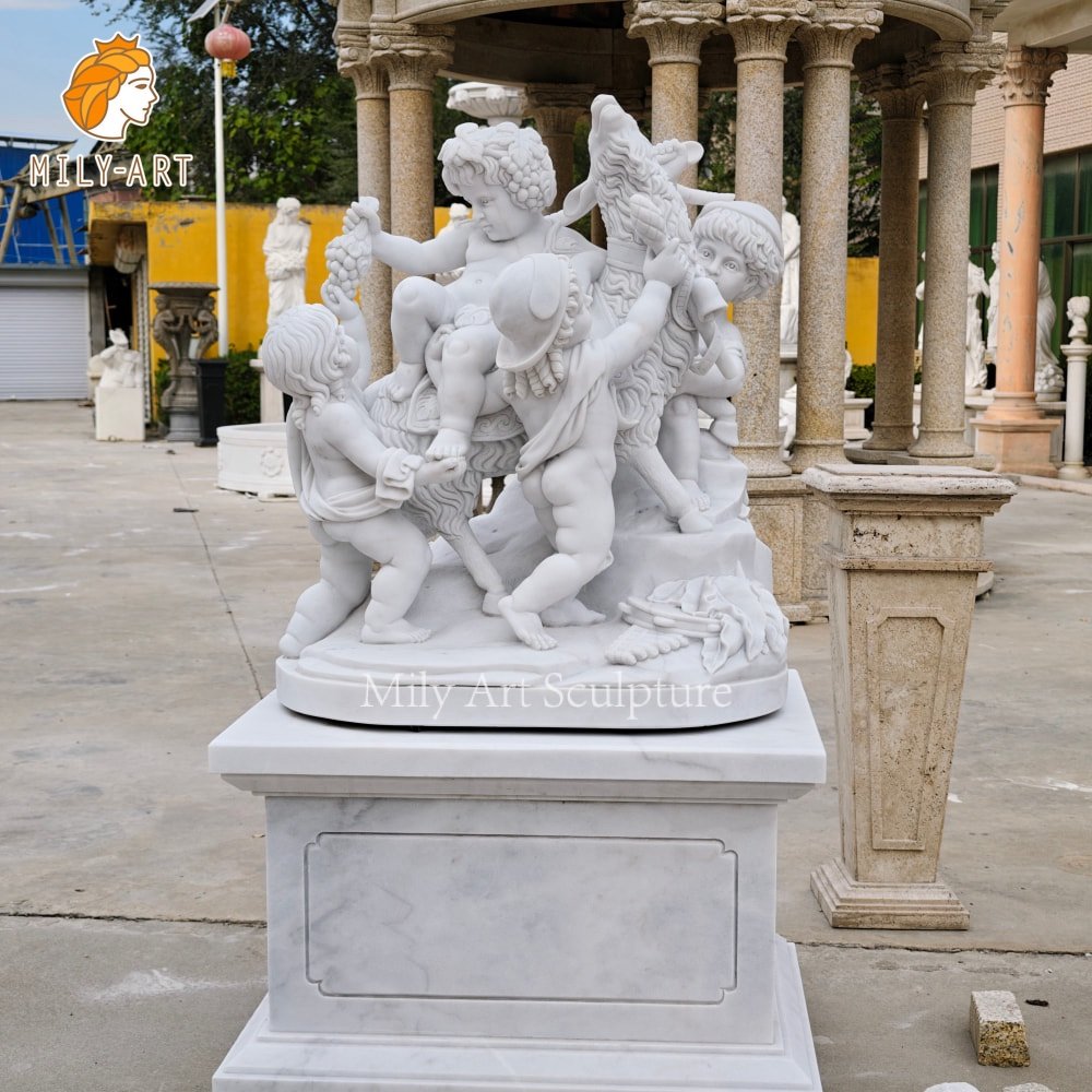 Hand-carved white marble replica of the Triumph of Bacchus depicting putti and a goat White marble Triumph of Bacchus group with putti and a goat in the factory courtyard